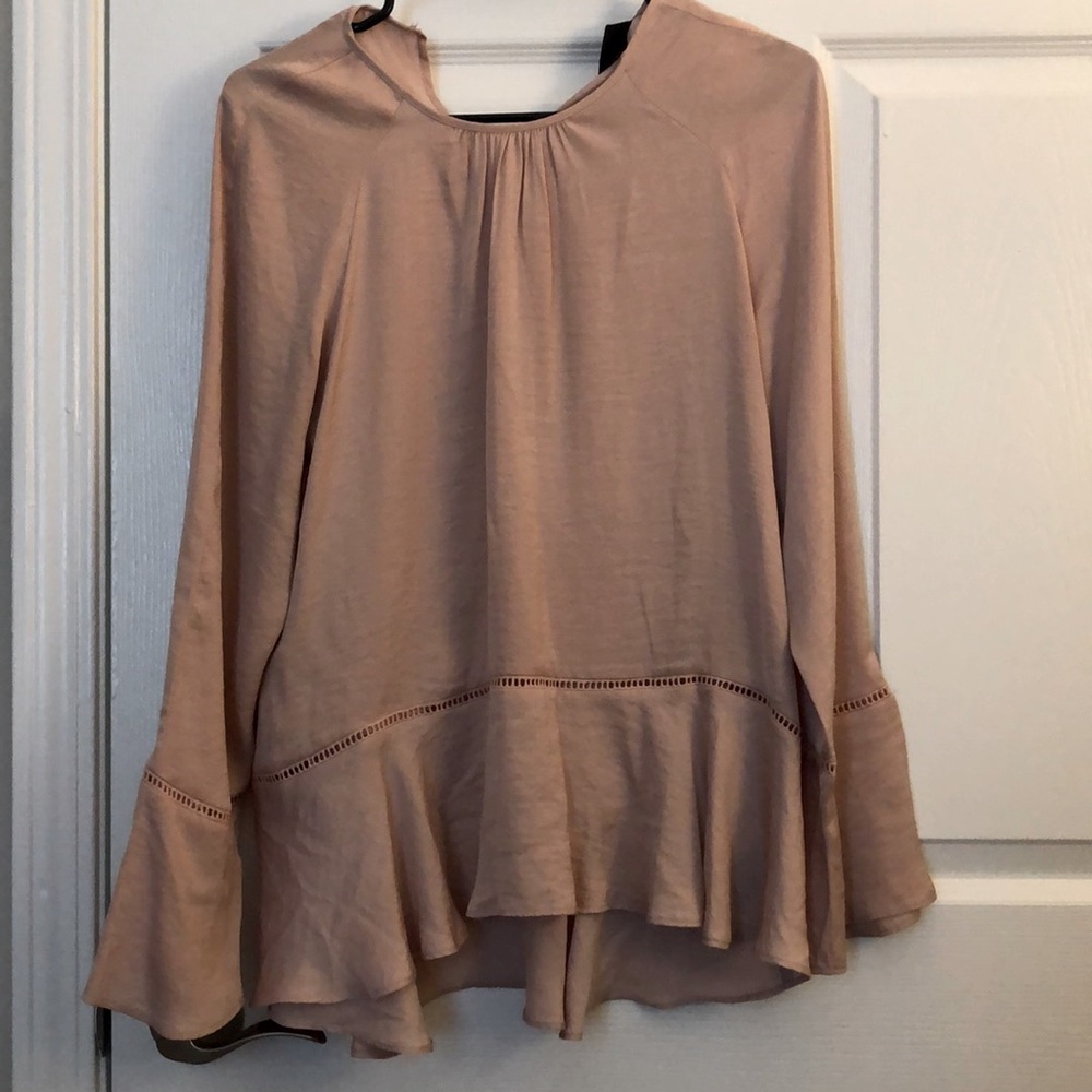 Pink blouse.